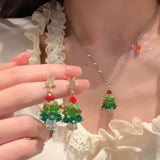 MAYTRENDS  -  Korean Sweet 3D Bowknot Christmas Tree Earrings For Women Green Crystal Xmas Tree Drop Earrings Merry Christmas Jewelry Gifts